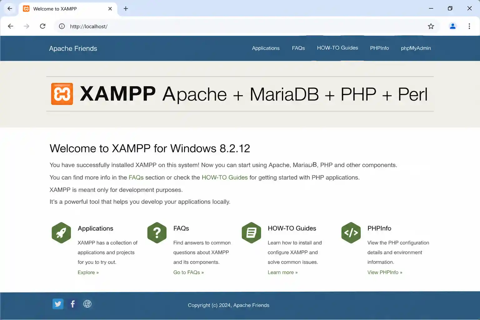 Browser showing the XAMPP welcome dashboard at localhost after a successful install