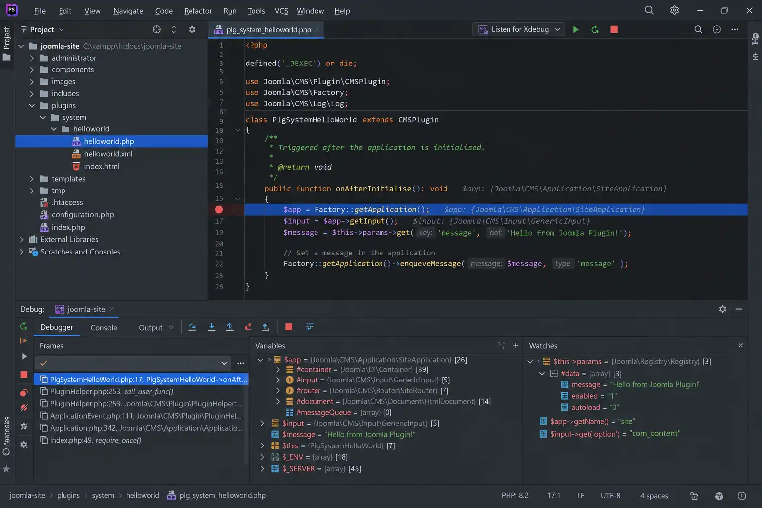 PhpStorm debugger paused at a breakpoint inside a Joomla plugin file with the variables panel open