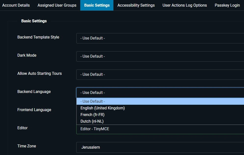 Joomla 6 user account Basic Settings tab showing Admin Language, Editor, and Time Zone fields