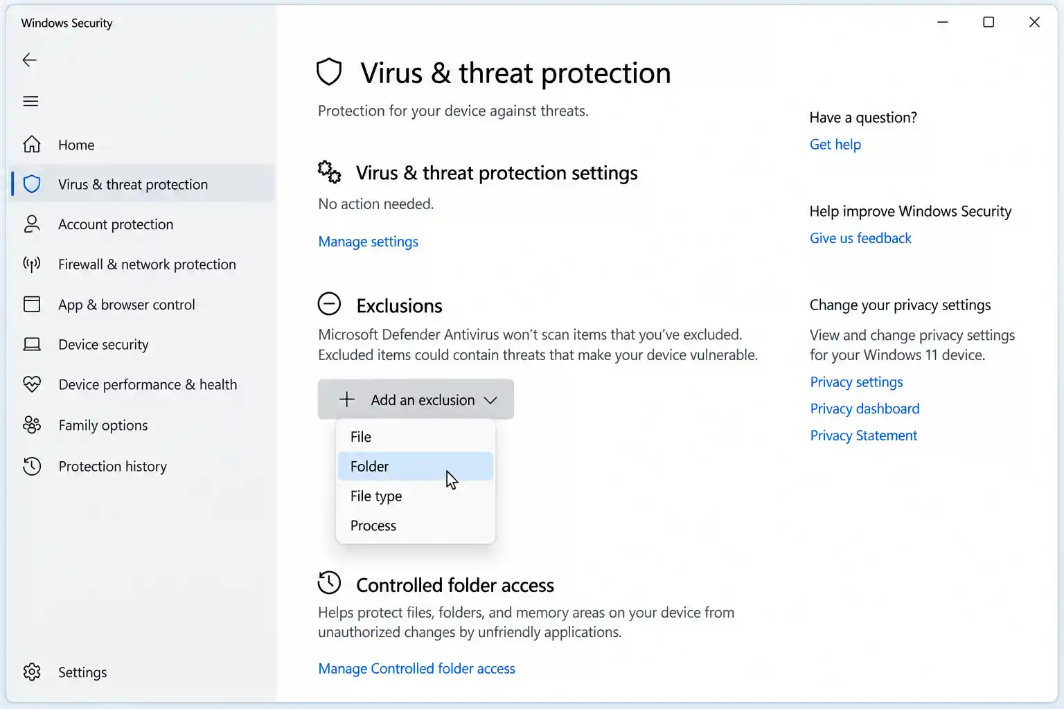 Windows Security exclusions screen showing Add a folder exclusion option
